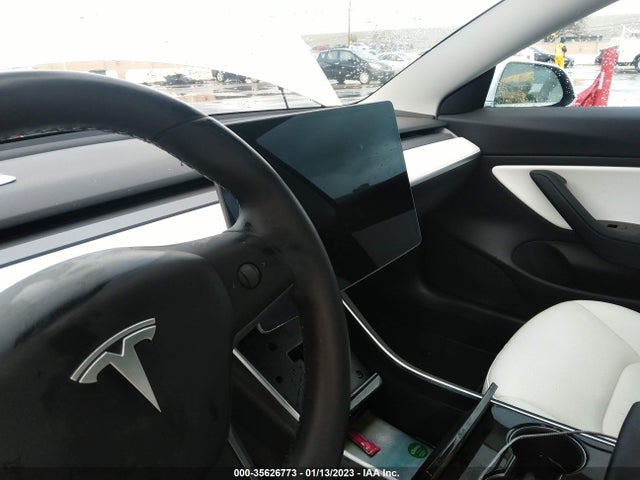 2018 Tesla 3, VIN: 5YJ3E1EB0JF135531