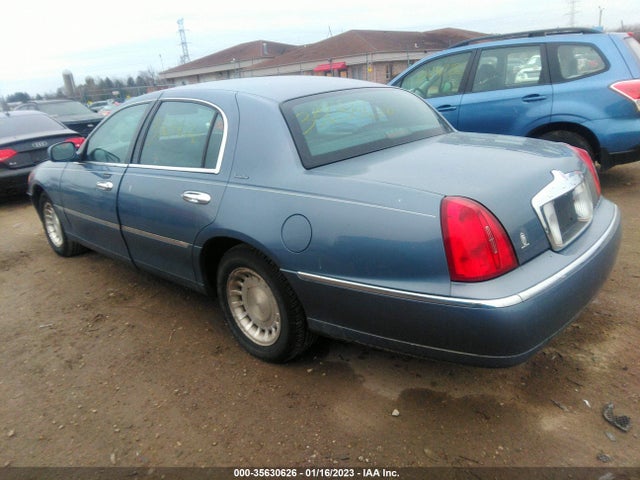 Lincoln Town Car 2000 1LNHM81W9YY851201 Image 4
