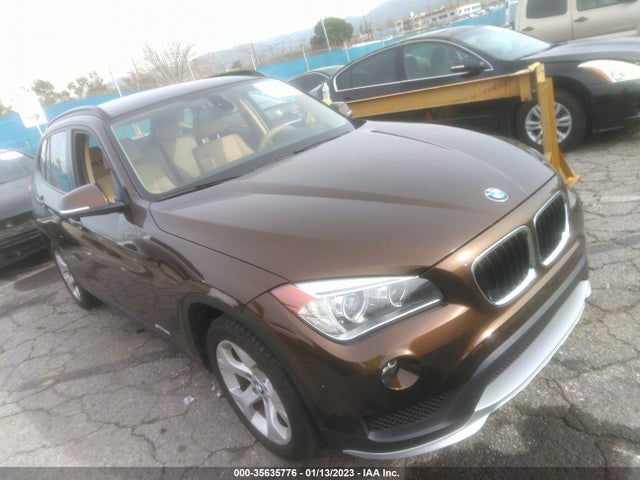 2015 BMW X1, VIN: WBAVM1C52FV497794