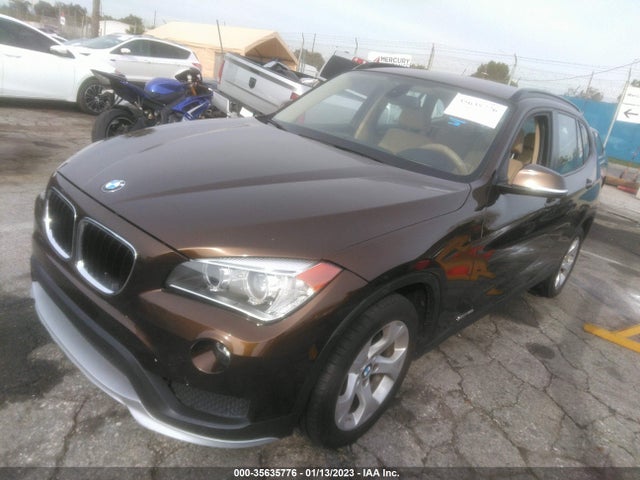 2015 BMW X1, VIN: WBAVM1C52FV497794