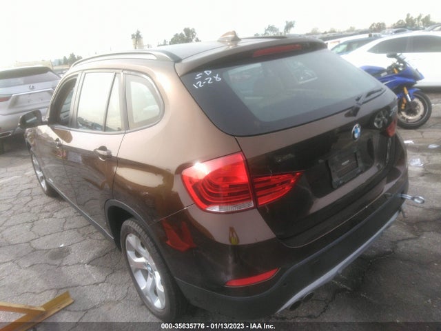 2015 BMW X1, VIN: WBAVM1C52FV497794