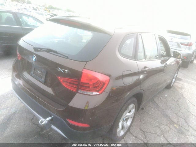 2015 BMW X1, VIN: WBAVM1C52FV497794