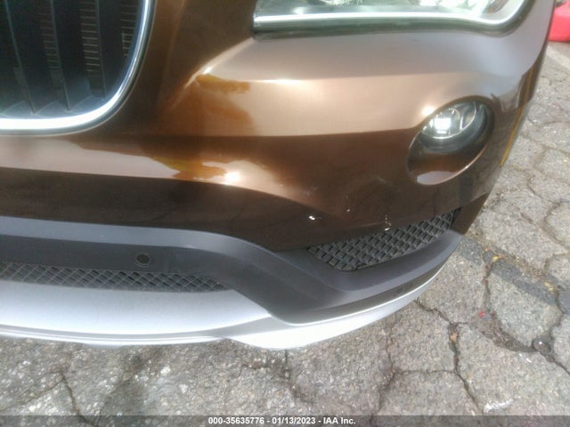 2015 BMW X1, VIN: WBAVM1C52FV497794