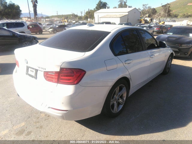 WBA3B1C57EK132900 BMW 3 Series 320i