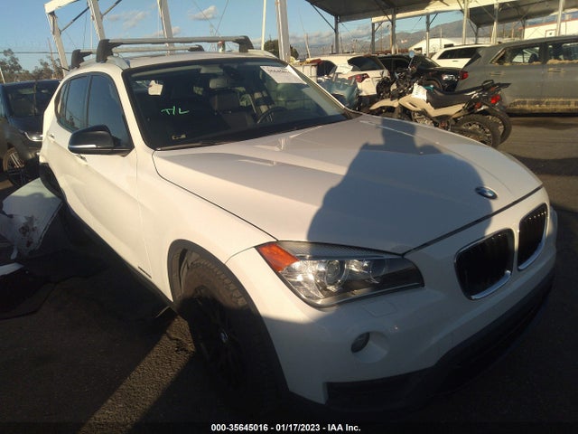 2014 BMW X1, VIN: WBAVM5C53EVV91270