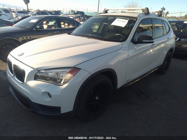 2014 BMW X1, VIN: WBAVM5C53EVV91270