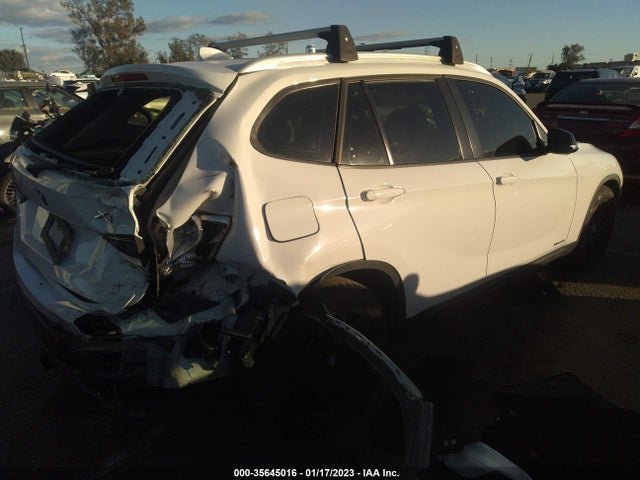 2014 BMW X1, VIN: WBAVM5C53EVV91270