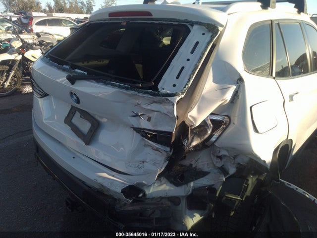 2014 BMW X1, VIN: WBAVM5C53EVV91270