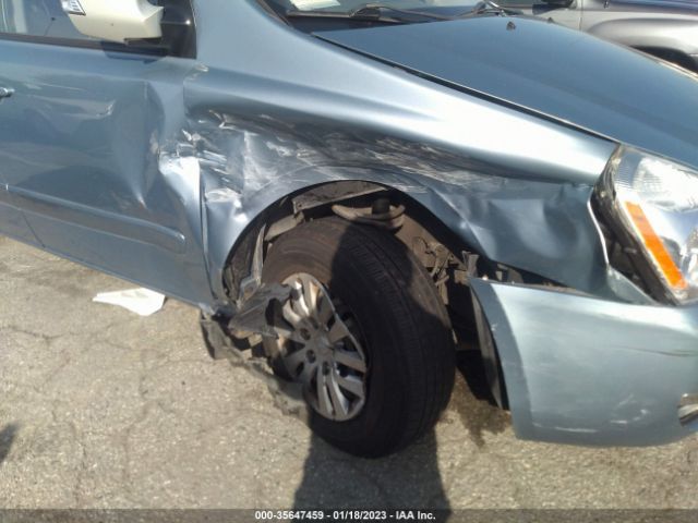 KNDMG4C76E6589833 KIA SEDONA LX