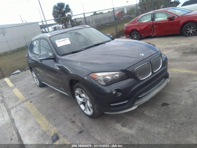 2015 BMW X1, VIN: WBAVM1C55FV315697