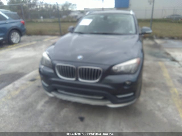 2015 BMW X1, VIN: WBAVM1C55FV315697