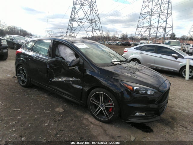 2016 Ford Focus, VIN: 1FADP3L90GL371621