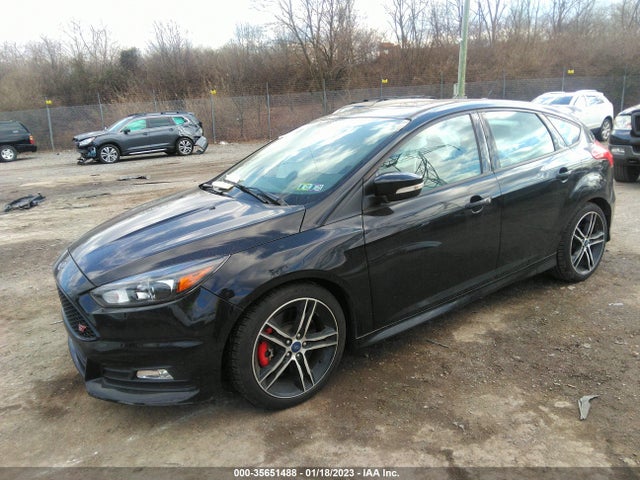 2016 Ford Focus, VIN: 1FADP3L90GL371621