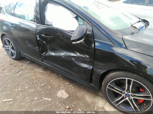 2016 Ford Focus, VIN: 1FADP3L90GL371621