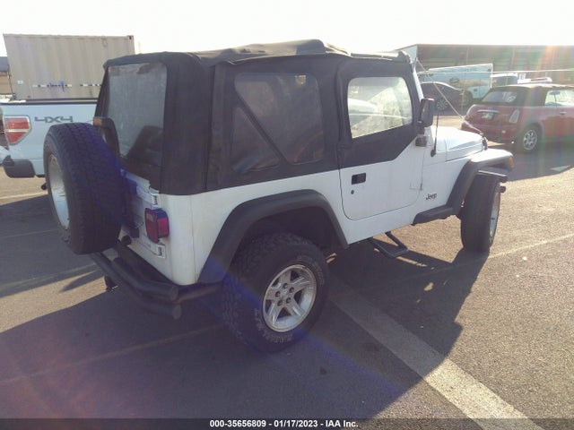 2000 JEEP WRANGLER SPORT VIN: 1J4FA49S3YP702460