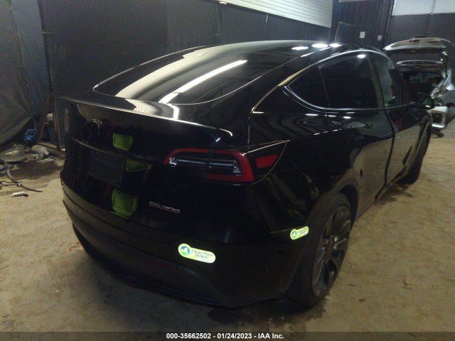 2021 Tesla Model Y, VIN: 5YJYGDEF6MF270523