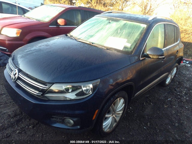 2013 VOLKSWAGEN TIGUAN SE W/SUNROOF & NAV VIN: WVGAV7AX8DW557618