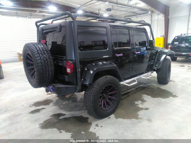 1C4BJWDG0EL108432 Jeep Wrangler Unlimited Sport