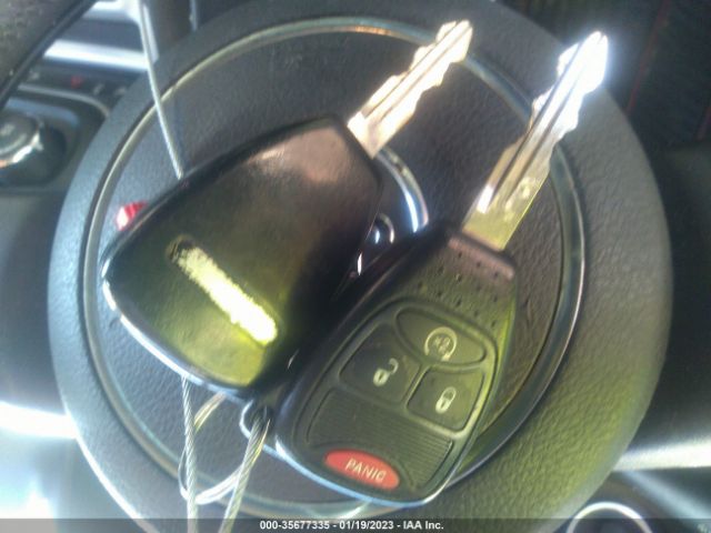 1C4NJCEAXED631246 Jeep Compass Latitude