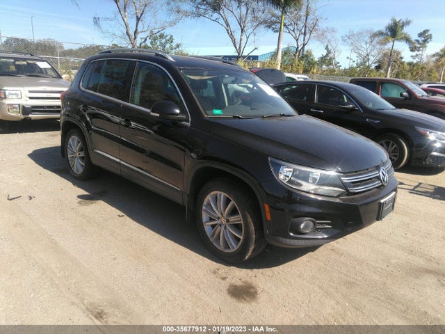 2013 VOLKSWAGEN TIGUAN SE W/SUNROOF & NAV VIN: WVGBV3AX2DW567770