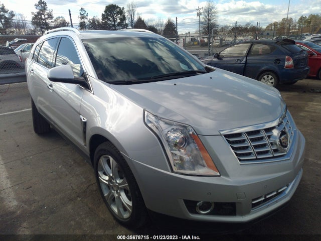 2015 Cadillac SRX, VIN: 3GYFNFE34FS587073