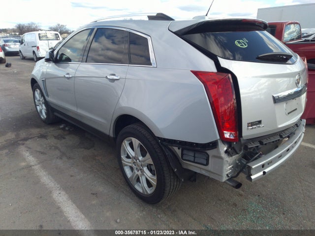 2015 Cadillac SRX, VIN: 3GYFNFE34FS587073
