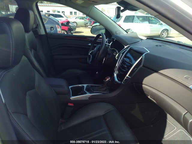 2015 Cadillac SRX, VIN: 3GYFNFE34FS587073