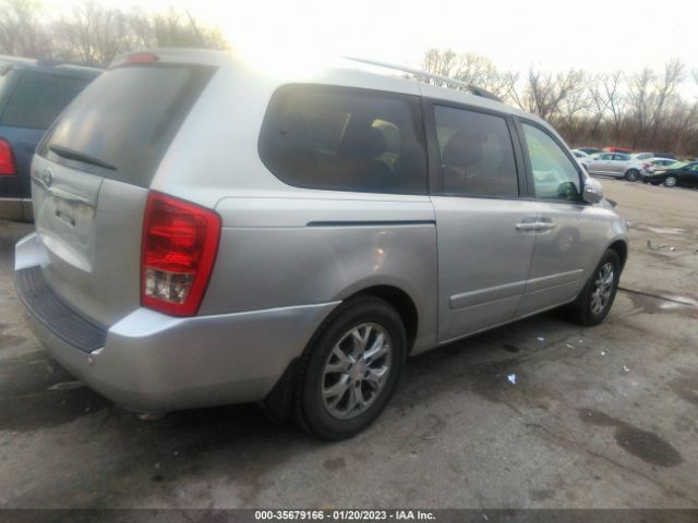 KNDMG4C72E6547000 KIA SEDONA LX