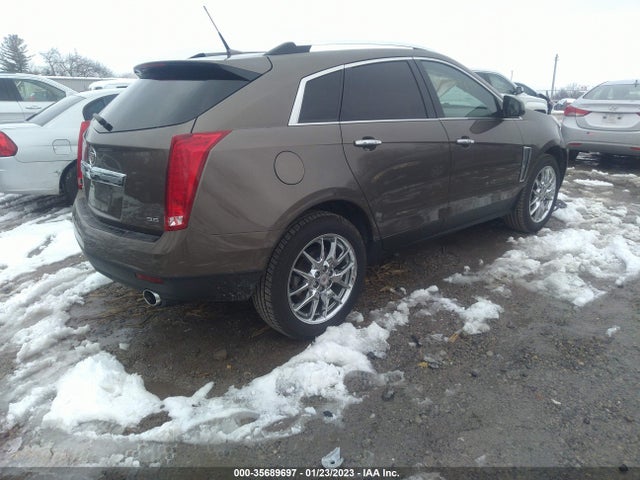 2014 Cadillac SRX, VIN: 3GYFNCE3XES599533