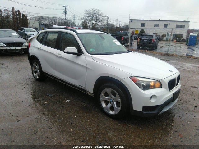 2014 BMW X1, VIN: WBAVM1C58EVW49396