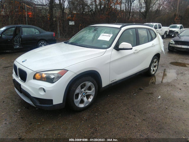 2014 BMW X1, VIN: WBAVM1C58EVW49396