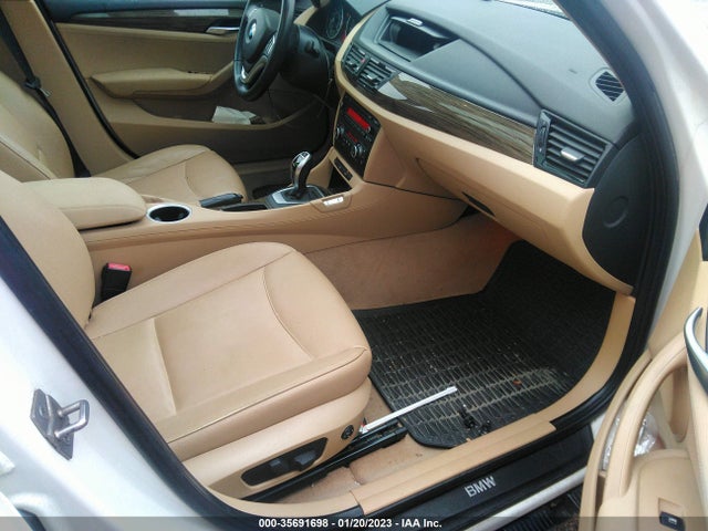 2014 BMW X1, VIN: WBAVM1C58EVW49396