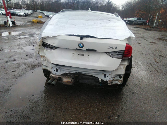 2014 BMW X1, VIN: WBAVM1C58EVW49396