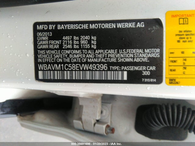 2014 BMW X1, VIN: WBAVM1C58EVW49396