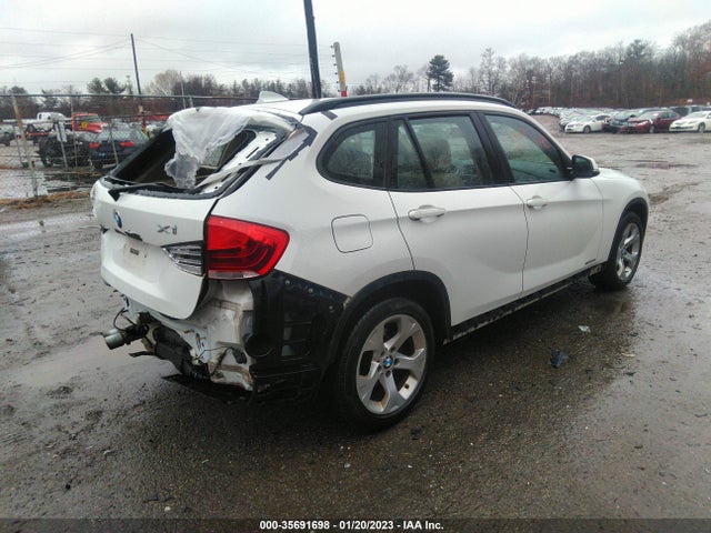 2014 BMW X1, VIN: WBAVM1C58EVW49396