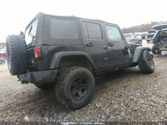 1C4BJWDG5EL259590 Jeep Wrangler Unlimited Sport