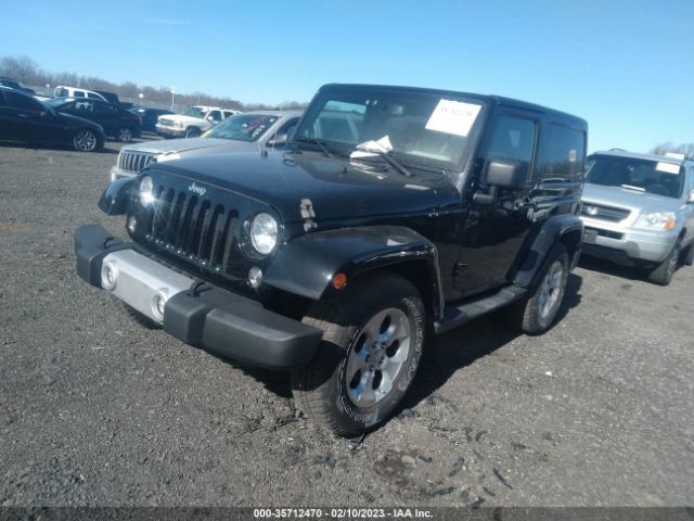 1C4GJWBG3EL141904 Jeep Wrangler Sahara
