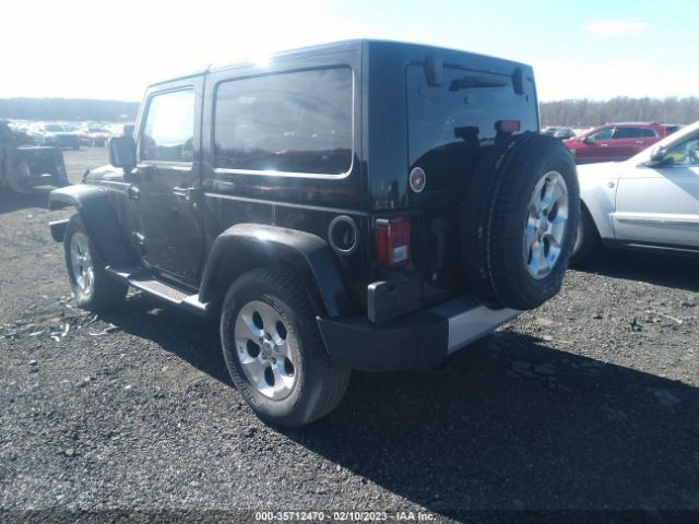1C4GJWBG3EL141904 Jeep Wrangler Sahara