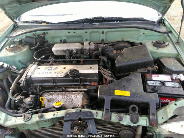 2003 HYUNDAI ACCENT VIN: KMHCF35C43U242086