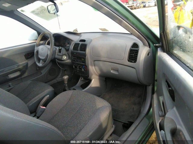 2003 HYUNDAI ACCENT VIN: KMHCF35C43U242086