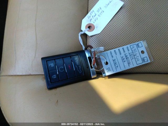 2014 Cadillac SRX, VIN: 3GYFNBE36ES587776