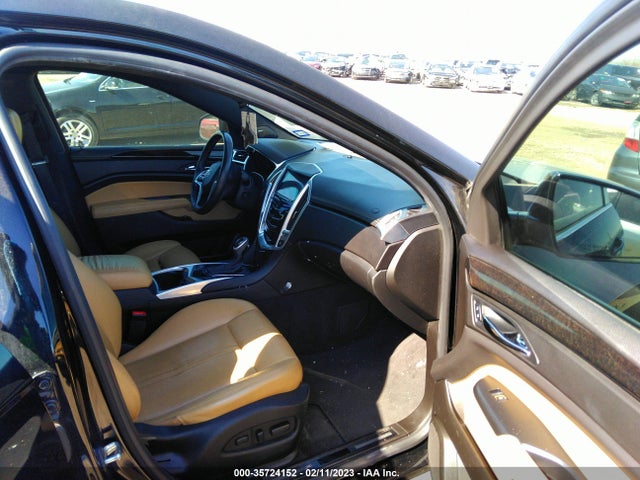 2014 Cadillac SRX, VIN: 3GYFNBE36ES587776