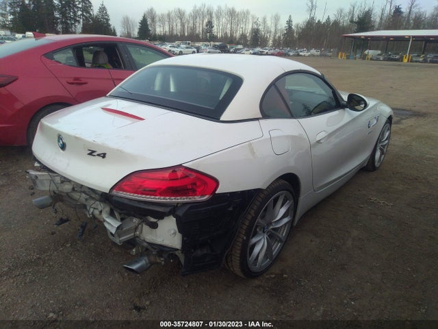 2014 BMW Z4, VIN: WBALM7C56EE386352