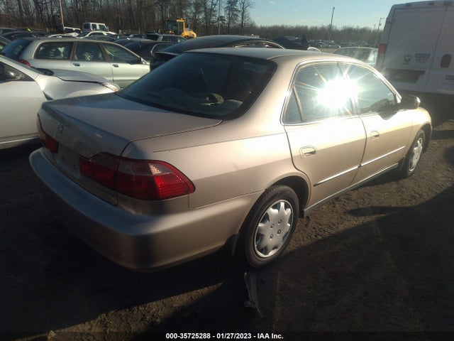 2000 HONDA ACCORD 2.3 LX VIN: 1HGCG6652YA002094