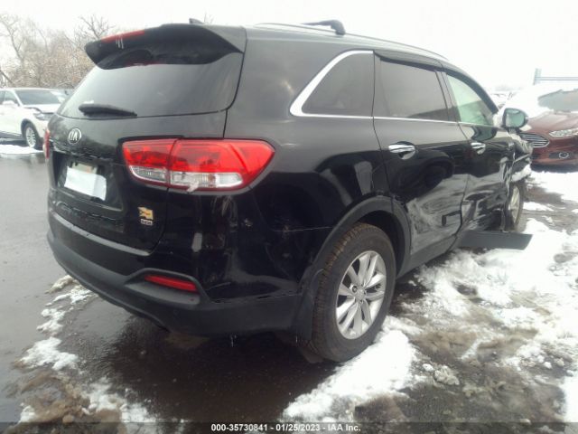 5XYPGDA38GG023606 KIA SORENTO LX