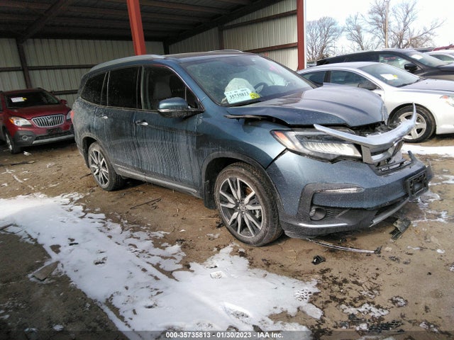 Honda Pilot Touring 8-passenger 2021 5FNYF6H97MB026299 Image 1
