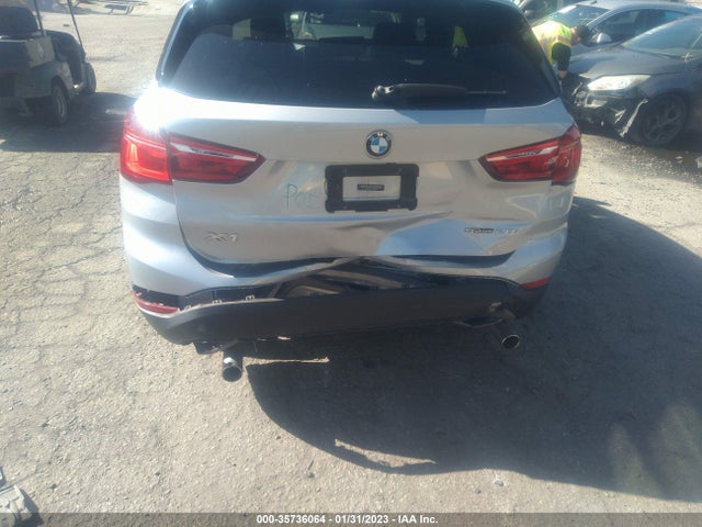 2018 BMW X1, VIN: WBXHU7C34J5L08026