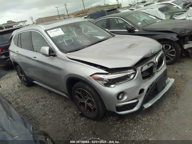 2018 BMW X1, VIN: WBXHU7C34J5L08026
