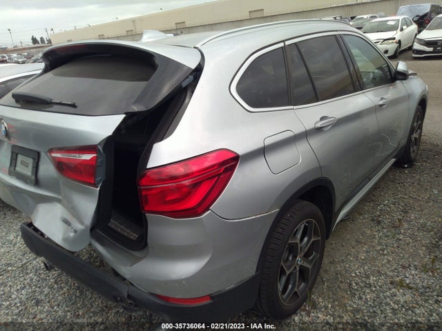 2018 BMW X1, VIN: WBXHU7C34J5L08026