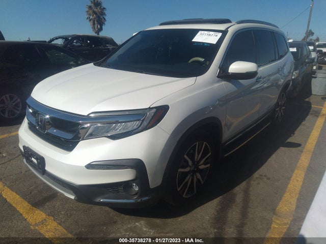 Honda Pilot Touring 8-passenger 2019 5FNYF5H94KB005580 Image 2